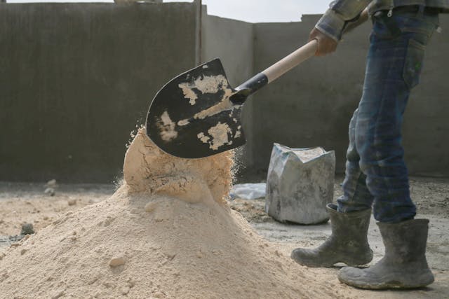 Sand being prepared for mixing of concrete